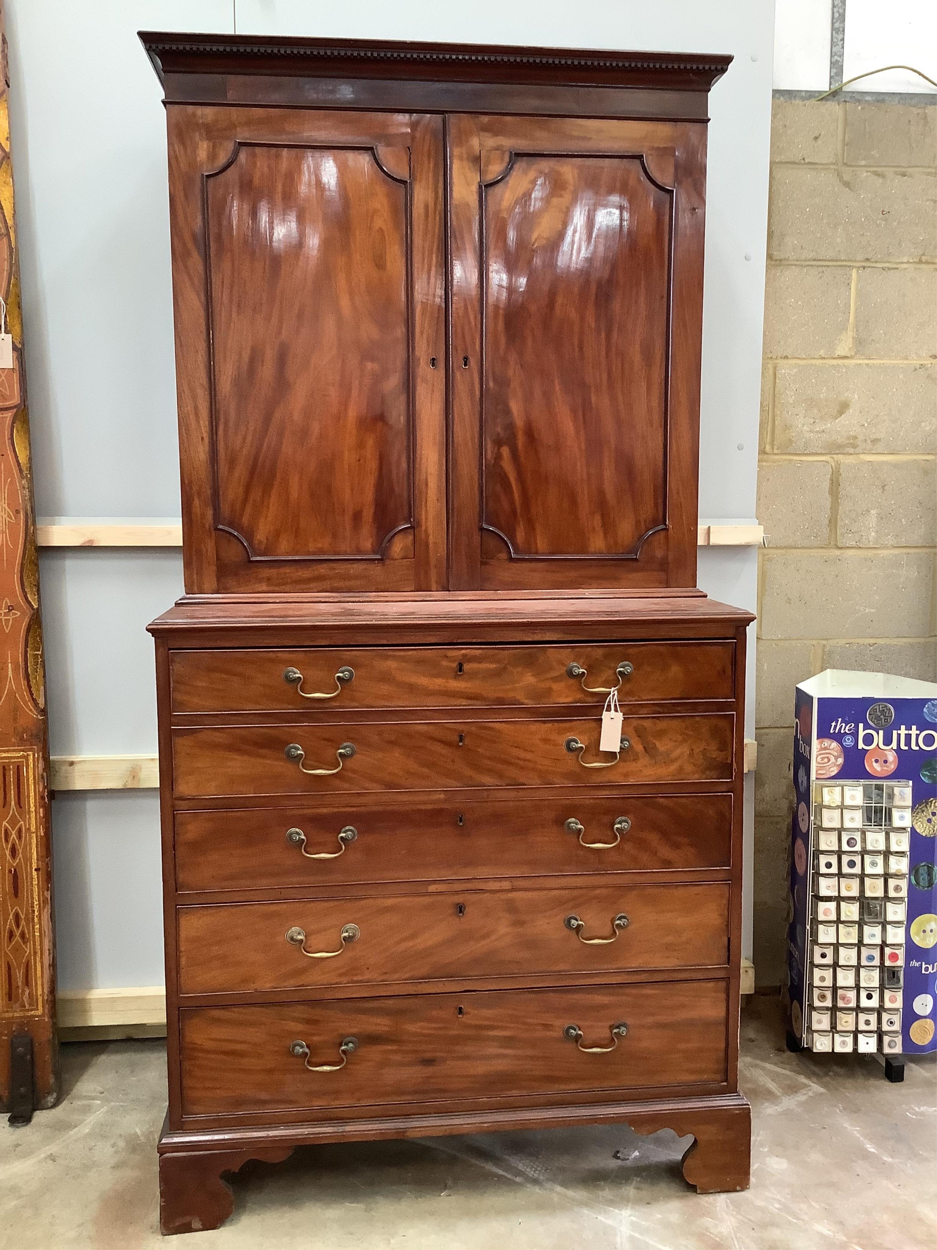 A George III mahogany secretaire cabinet, width 108cm, depth 56cm, height 213cm. Condition - fair